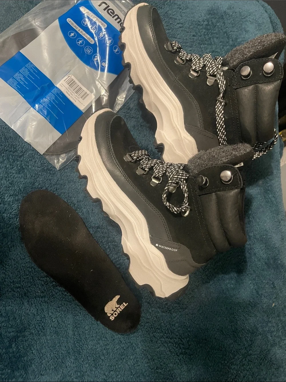 Sorel  Black and White Lace-Up Waterproof Winter Boots
